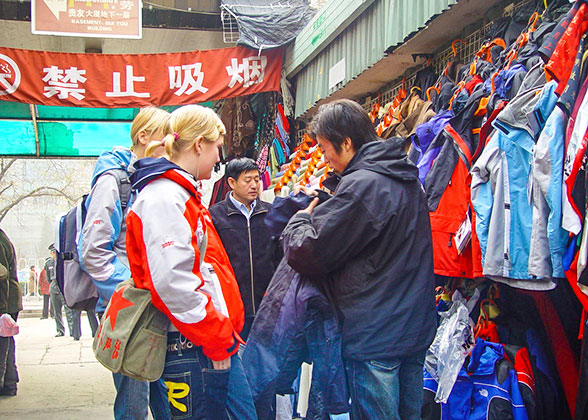 Buying clothes in Xiushui Street, Beijing
